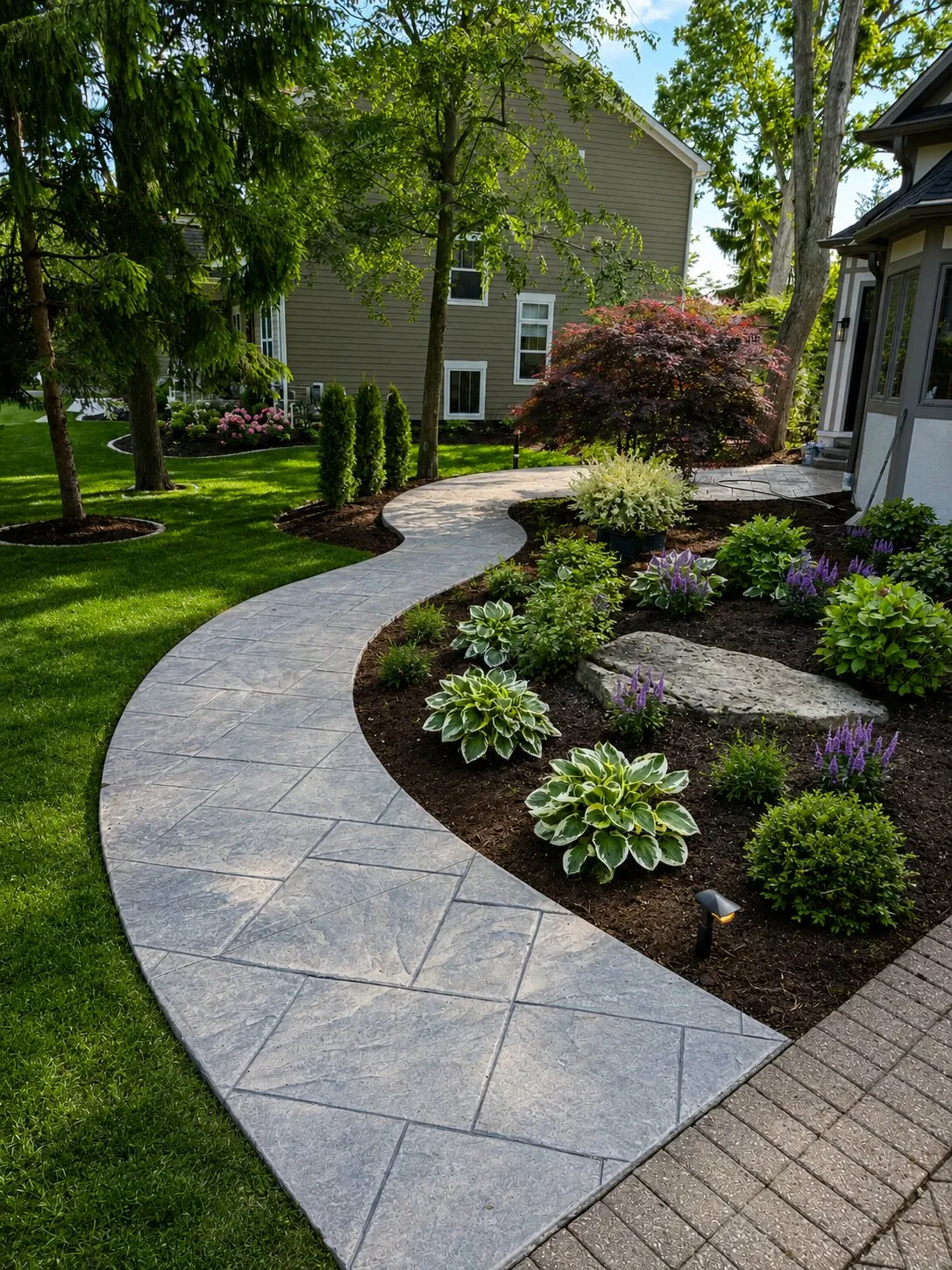 Stamped and decorative concrete project by SunScapes Ohio 1
